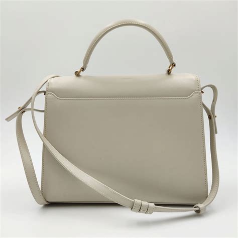 Borsa porta smartphone Cassandre in pelle in Beige .